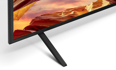 Detalle del soporte delgado en forma de cuña con una imagen de un paisaje rocoso