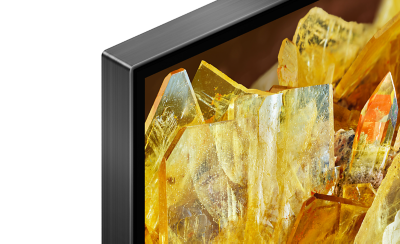 Corner of TV showing gold crystals on screen