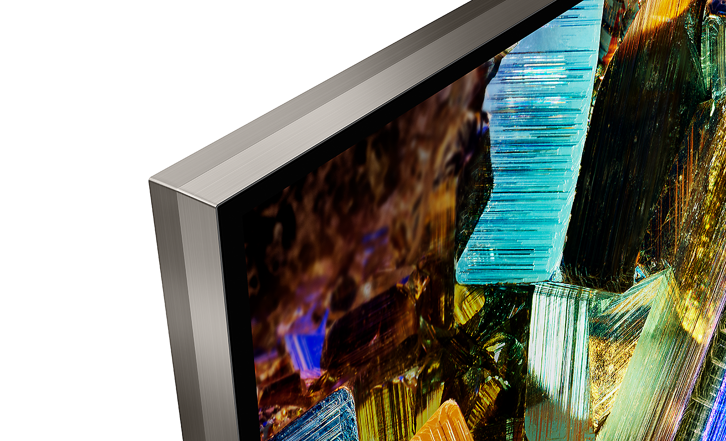 Detaljbilde av hjørnet av en BRAVIA-TV som viser det praktisk talt rammeløse designet med sømløs kant og et skjermbilde av fargerike esker