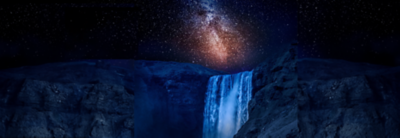 Dramatic image of the night sky above a waterfall