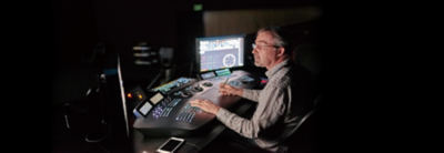 Man working in a studio on a production edit