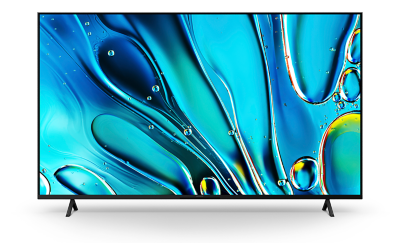 Front view of TV on stand with screenshot of blue water droplets