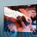 Angled view of TV with musician playing a double bass and sound waves projected from screen