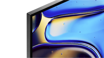 Imagine detaliata cu coltul de sus al televizorului, cu imagine cu picaturi de apa galbene, negre si albastre