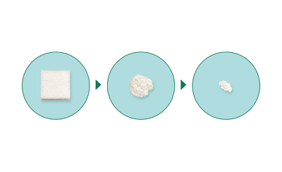 Graphic of three circles connected by arrows: the first circle contains a large piece of marine biodegradeable material, the second circle shows the material smaller and the third circle shows the material very small