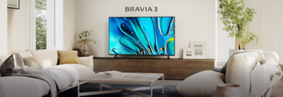 Televisor BRAVIA 3 que muestra imágenes abstractas azuladas vibrantes en una sala de estar moderna.