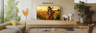 BRAVIA 5 TV displaying a musician playing a cello in a golden field, set in a modern living room.