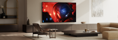 Wall-mounted BRAVIA 9 II TV displaying a vivid scene of an astronaut in a modern living room