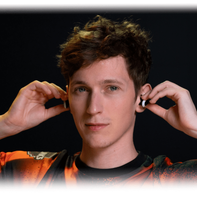 Profile image of Boaster placing a pair of white INZONE Buds into his ears