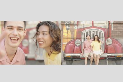 Young couple shoot a video in front of the mural