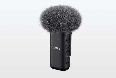 Imagen de producto del micrófono con paravientos acoplado