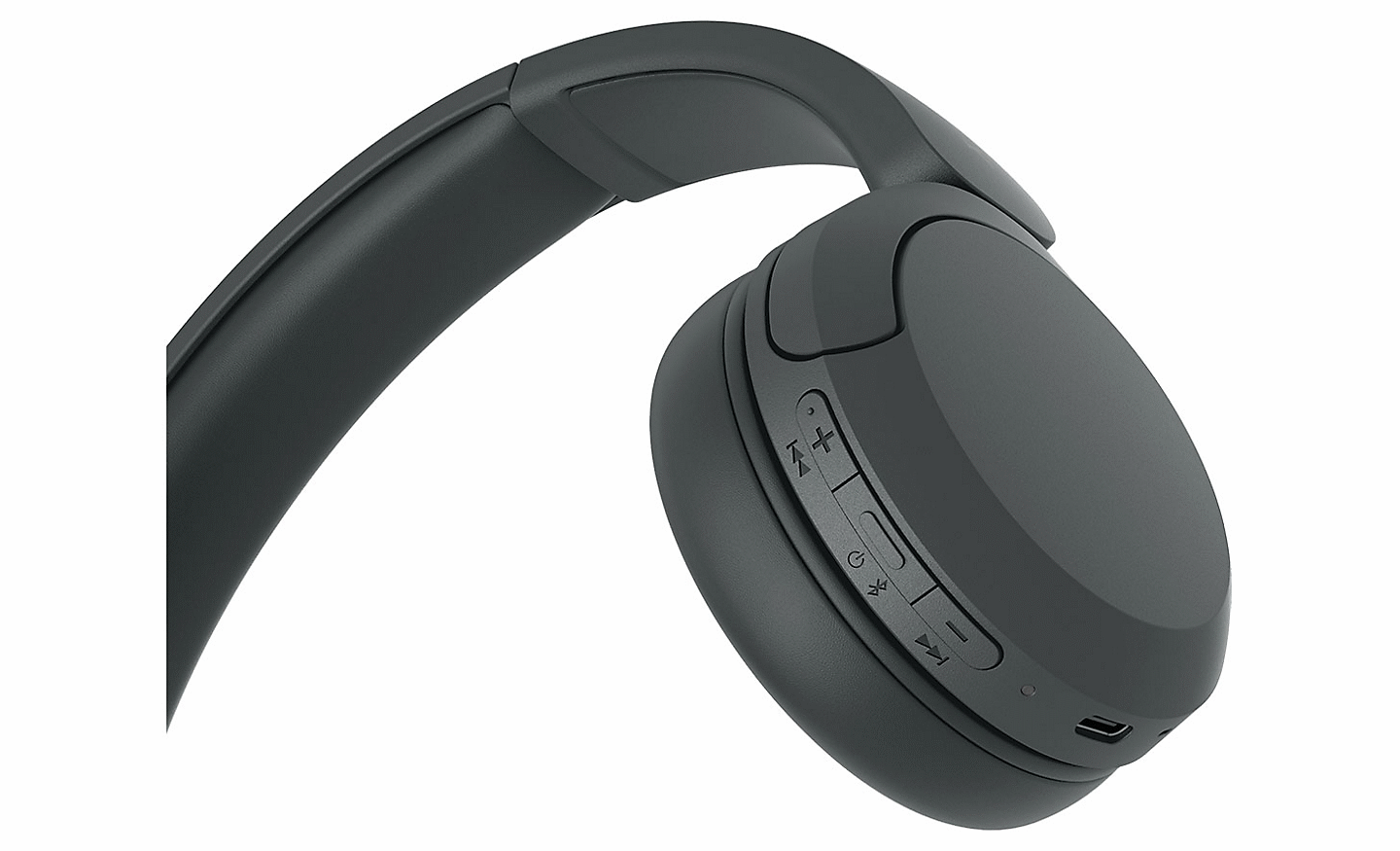 Close up image of the buttons on a black pair of Sony WH-CH520 headphones