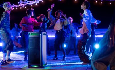 People dancing around the ULT TOWER outside