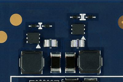 Macro shot of power regulation components on circuit board