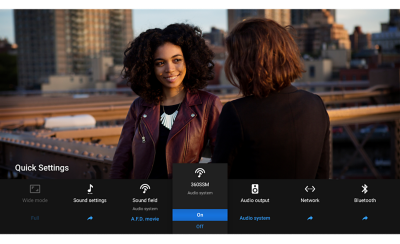 Image of the BRAVIA Quick Settings interface below an image of two women on a roof top
