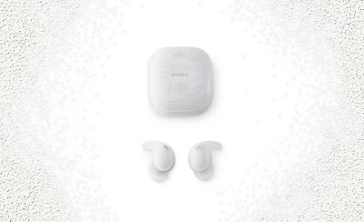 A pair of white Sony LinkBuds Fit and their accompanying charging case on a white background.