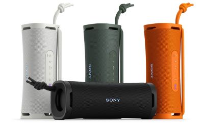 Four ULT FIELD 1 portable speakers in different colours, including Black, Off White, Forest Gray and Orange.