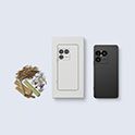 Czarny telefon obok białego etui na telefon i akcesoriów