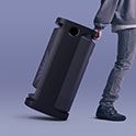 Image of a person rolling the SRS-XV900 wireless speaker with its convenient carry handle
