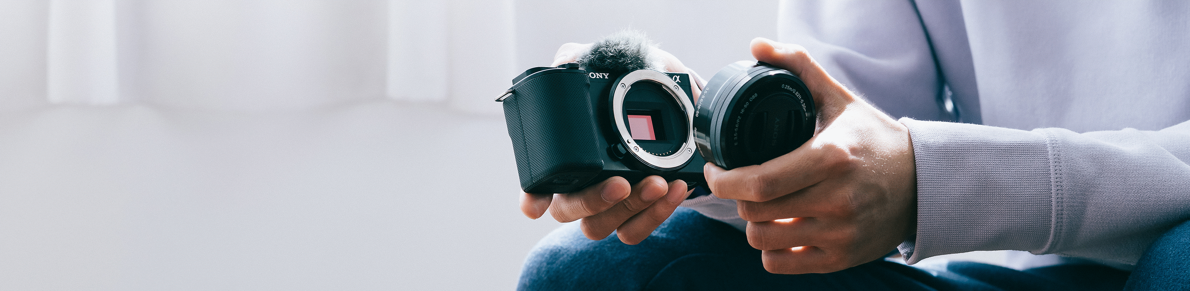 Picture of a person changing the lens