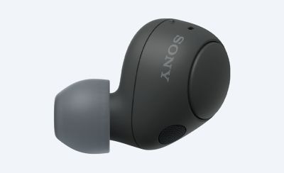 Close up side on image of one black WF-C700N ear bud