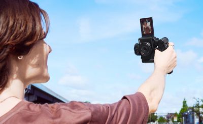 Image of a person shooting vertical video