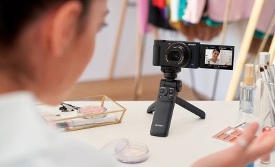 I'm taking a selfie with a tripod on my desk.