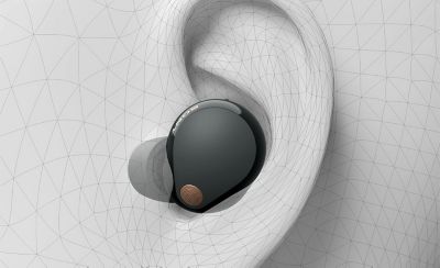 Image of the WF-1000XM5 headphone sitting inside a 3d drawing of an ear