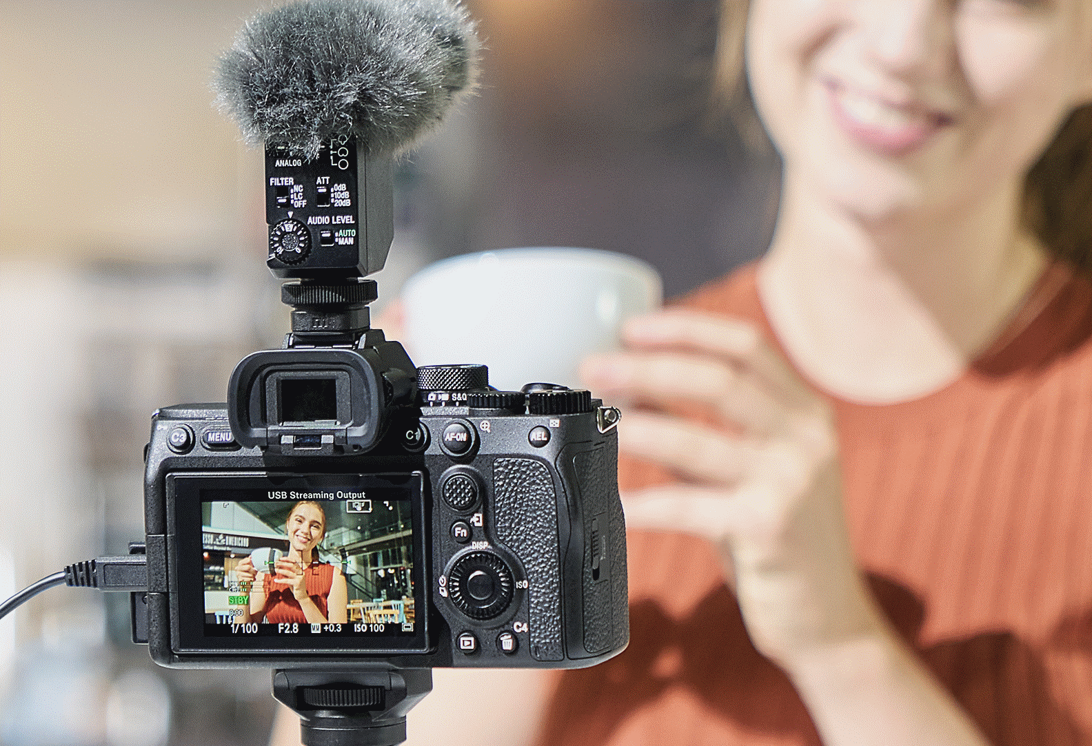 Photo of a person live-streaming with the camera