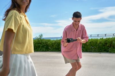 Photographer taking shot of a woman