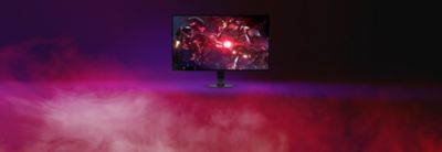 Monitor INZONE M10S II zobrazující herní scénu na červeném a fialovém pozadí