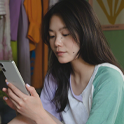 Image of a person reading from an Xperia 5 V