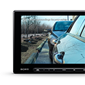 Image of the XAV-AX8500 in position with the right rear mirror camera displayed on-screen