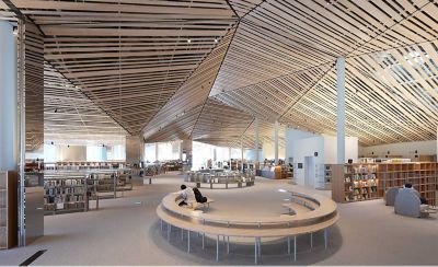 Image of the interior space of a large library with an elaborate design using many straight wood planks on the ceiling, with resolution to every corner of the screen