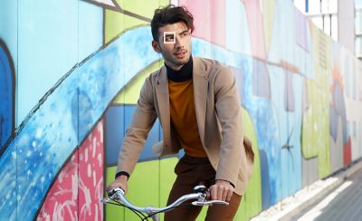 Image of a man riding a bicycle