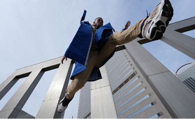 Image of a person jumping from a very close angle to the ground