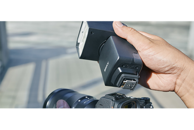 Image of metal shoe foot with rugged side frame under the flash