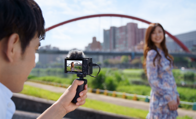 A person wearing a hat taking a selfie