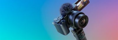 A diagonal shot of the camera with E PZ 16-50mm F3.5-5.6 OSS II zoom lens and GP-VPT2BT grip attached, taken from above