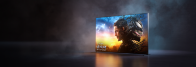 Три телевизори Bravia од Sony прикажани на црвен килим во гламурозен амбиент.