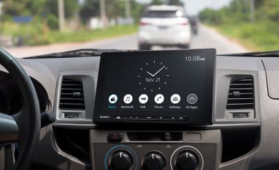 The XAV-AX8500 in position on a dashboard tilted towards the driver.