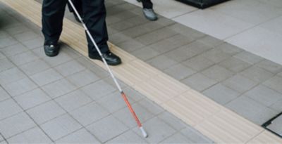 White cane and braille blocks