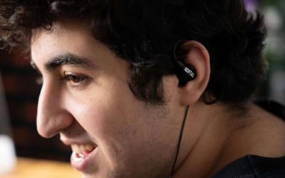 Image of Fnatic VALORANT pro player Alfajer testing the INZONE E9 headset